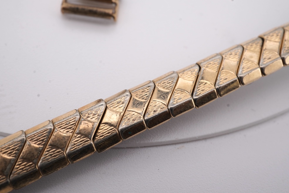 A lady's 1950's 9ct gold Tudor manual wind wrist watch, with Arabic dial, case diameter 18mm, on a damaged 9ct gold bracelet, gross weight 18.6 grams, together with a lady's 18ct gold Buren manual wind wrist watch, on a